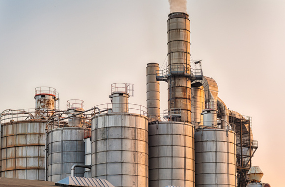 Silos and smokestacks of a factory