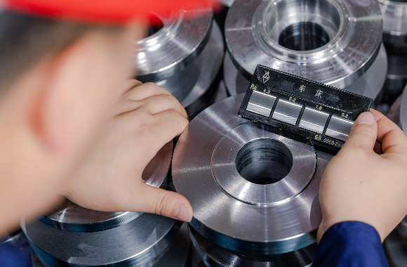 technician measuring the valve component