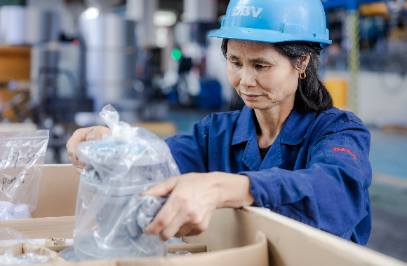 picking up a piece of valve